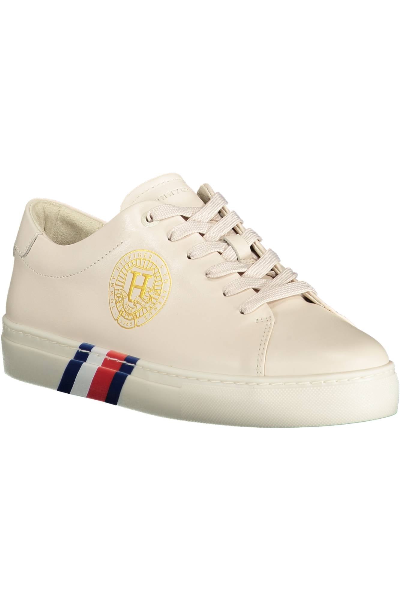Beige women's sports shoes